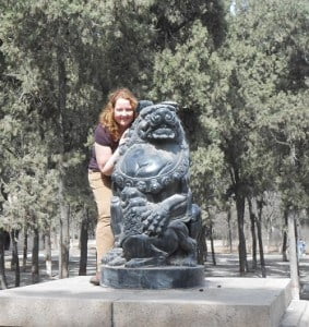 Kelly with statue-350