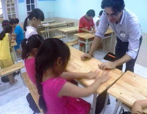 Talking to teachers - David West at Ky Nguyen School in Viet photo 1